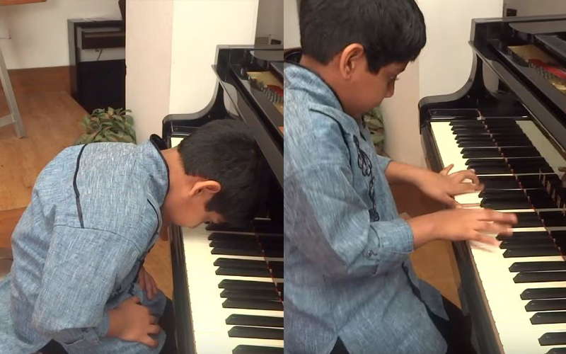 8歲男孩「頭趴在鋼琴上」一臉厭世，但當他雙手一碰琴鍵「高速華麗指法」轟動全網！